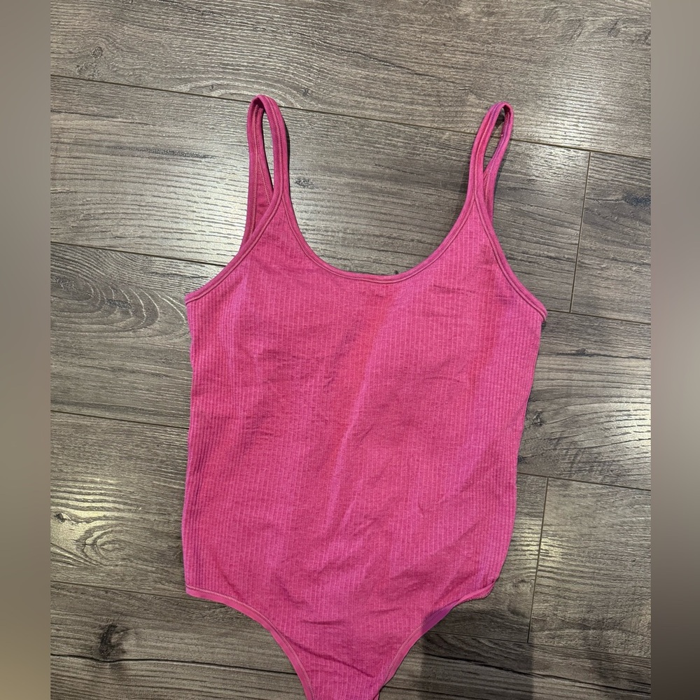 Lululemon ebb to street body suit - size medium! Barely worn, built in bra